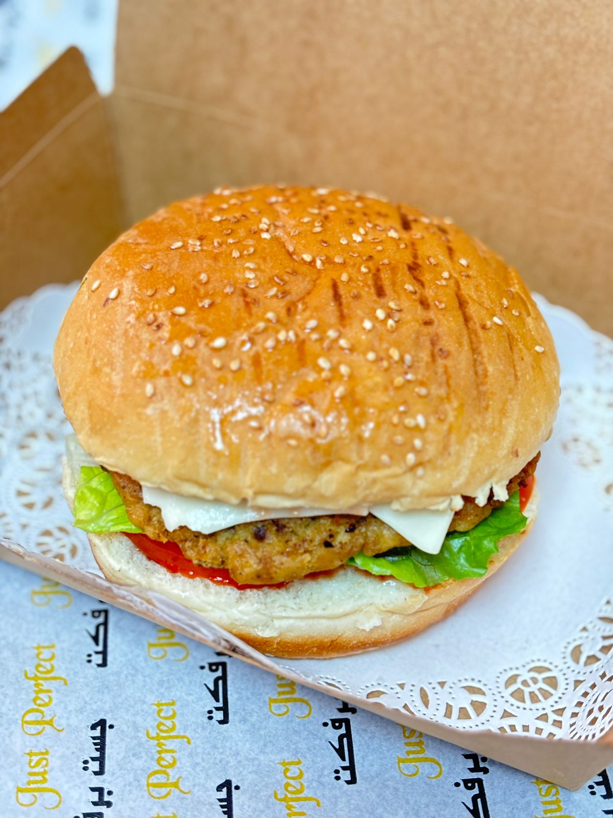 CHICKEN BURGER WITH CHEESE +AWAL JUICE